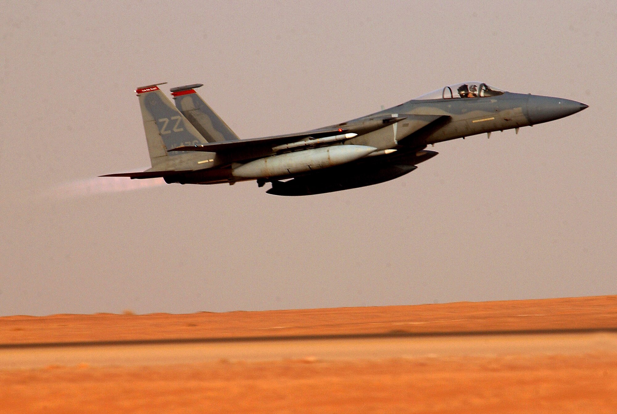 OPERATION IRAQI FREEDOM --  An F-15C Eagle from the 363rd Expeditionary Fighter Squadron takes off for an Operation Iraqi Freedom sortie March 23. Aircraft from the 363rd EFS work around the clock flying missions. (U.S. Air Force photo by Staff Sgt. Matthew Hannen)                       
