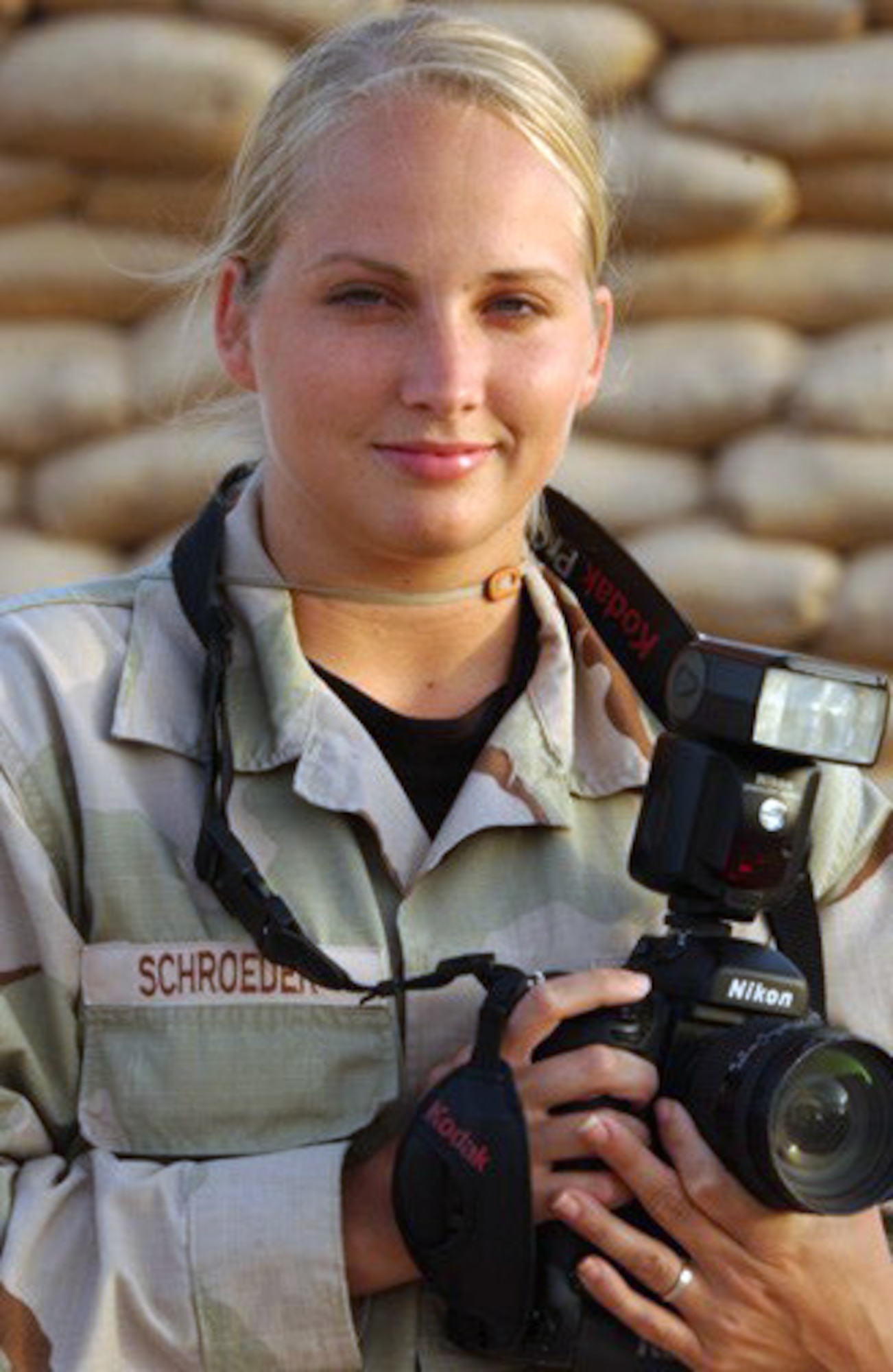 OPERATION IRAQI FREEDOM -- Senior Airman Tia Schroeder, a still photographer deployed with the 405th Expeditionary Communications Squadron, is a veteran participant of "MTV Diaries," a reality series that airs weekly on the international music TV channel. (U.S. Air Force photo by Staff Sgt. Cherie Thurlby)