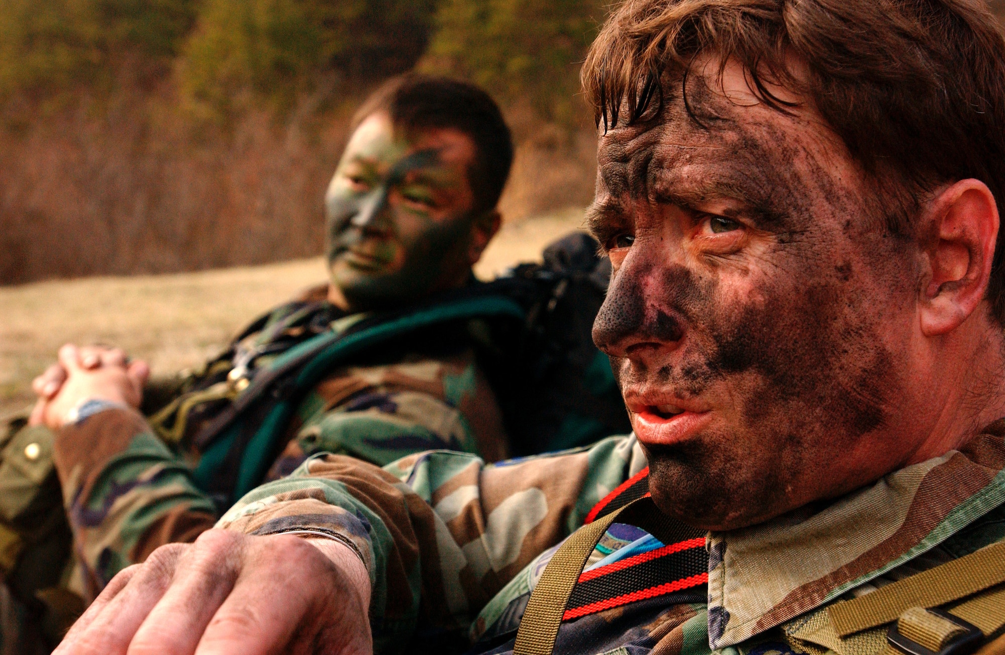 OSAN AIR BASE, South Korea -- Master Sgt. Mark Kuntz takes a break during a survival, evasion, resistance and escape exercise here.  As part of exercise Foal Eagle, Kuntz, a SERE instructor, is helping to train Korean air force members to navigate and guide Air Force rescue units to their location. (U.S. Air Force photo by Staff Sgt. Stacy Pearsall)