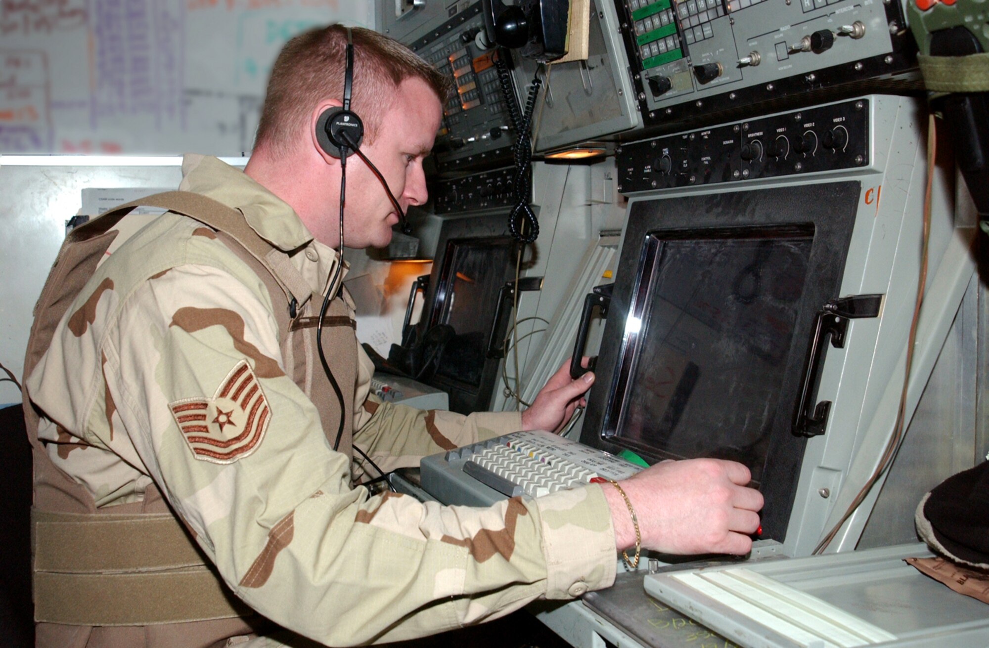 OPERATION IRAQI FREEDOM -- Tech. Sgt. Mark Morrison monitors aircraft returning to a forward-deployed location following strike missions against targets in Iraq.  He is an air traffic controller with the 332nd Expeditionary Operations Support Squadron and is deployed from the 46th Operations Support Squadron at Eglin Air Force Base, Fla.  (U.S. Air Force Photo by Master Sgt. Stefan Alford)

