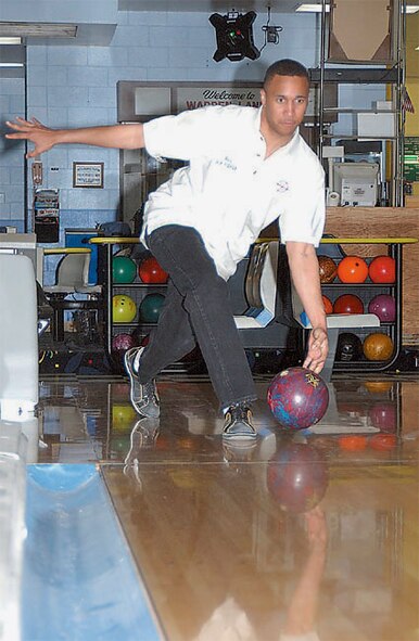 F.E. WARREN AIR FORCE BASE, Wyo. -- Second Lt. Rickie Banister, a 319th Missile Squadron missileer here, bowled over the competition overcoming a final day, 50-pin deficit and was crowned the best bowler in the U.S. Armed Forces at the Department of Defense tournament March 20 at Randolph Air Force Base, Texas.  (U.S. Air Force photo by Master Sgt. Jeff Bohn)

