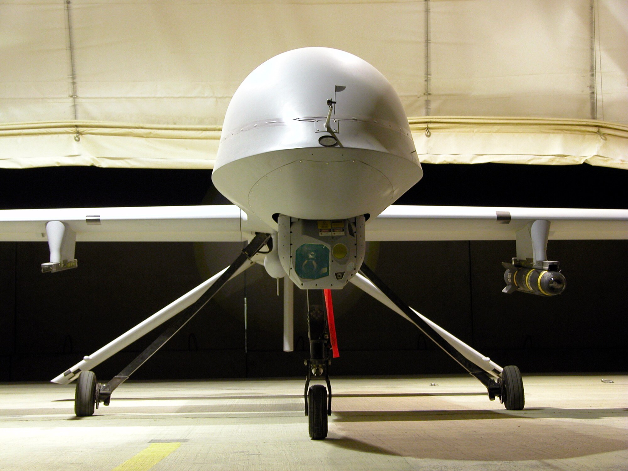 OPERATION IRAQI FREEDOM - An RQ-1 Predator assigned to the 15th Expeditionary Reconnaissance Squadron awaits its next mission at a forward-deployed location.  The Department of Defense's Unmanned Aerial Vehicles Roadmap provides a defensewide vision for UAVs and related technology.  (U.S. Air Force photo by Capt. John Sheets)