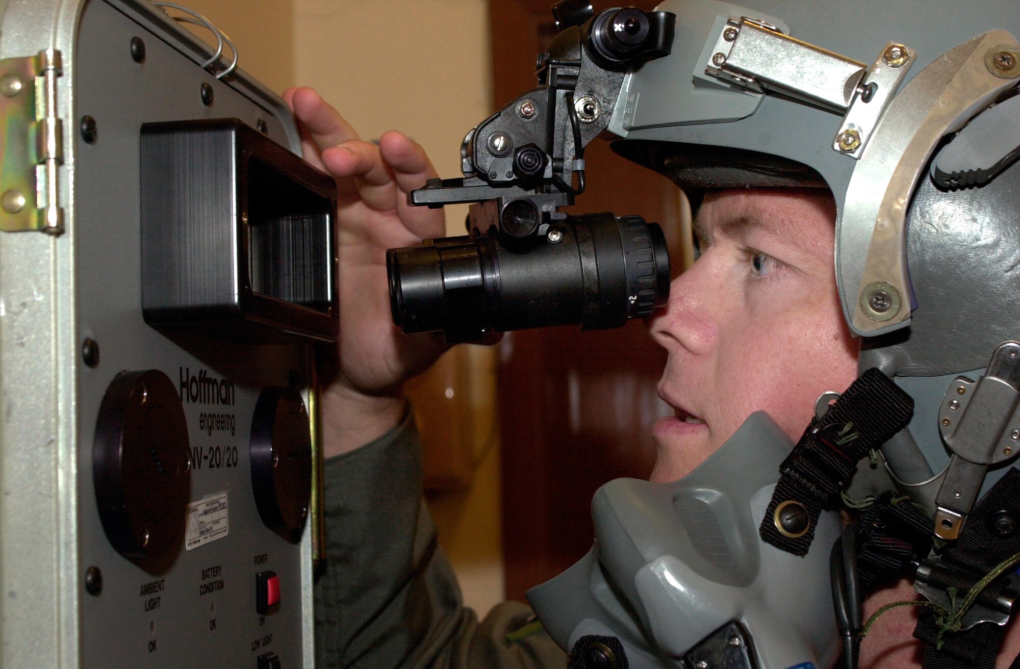 OPERATION IRAQI FREEDOM -- Capt. Steven, a B-52 Stratofortress pilot from Minot Air Force Base, N.D., checks his night vision equipment at a forward deployed Operation Iraqi Freedom locatin.  He is deployed to the 457th Air Expeditionary Group.  (U.S. Air Force photo by Airman 1st Class Stacia M. Willis)