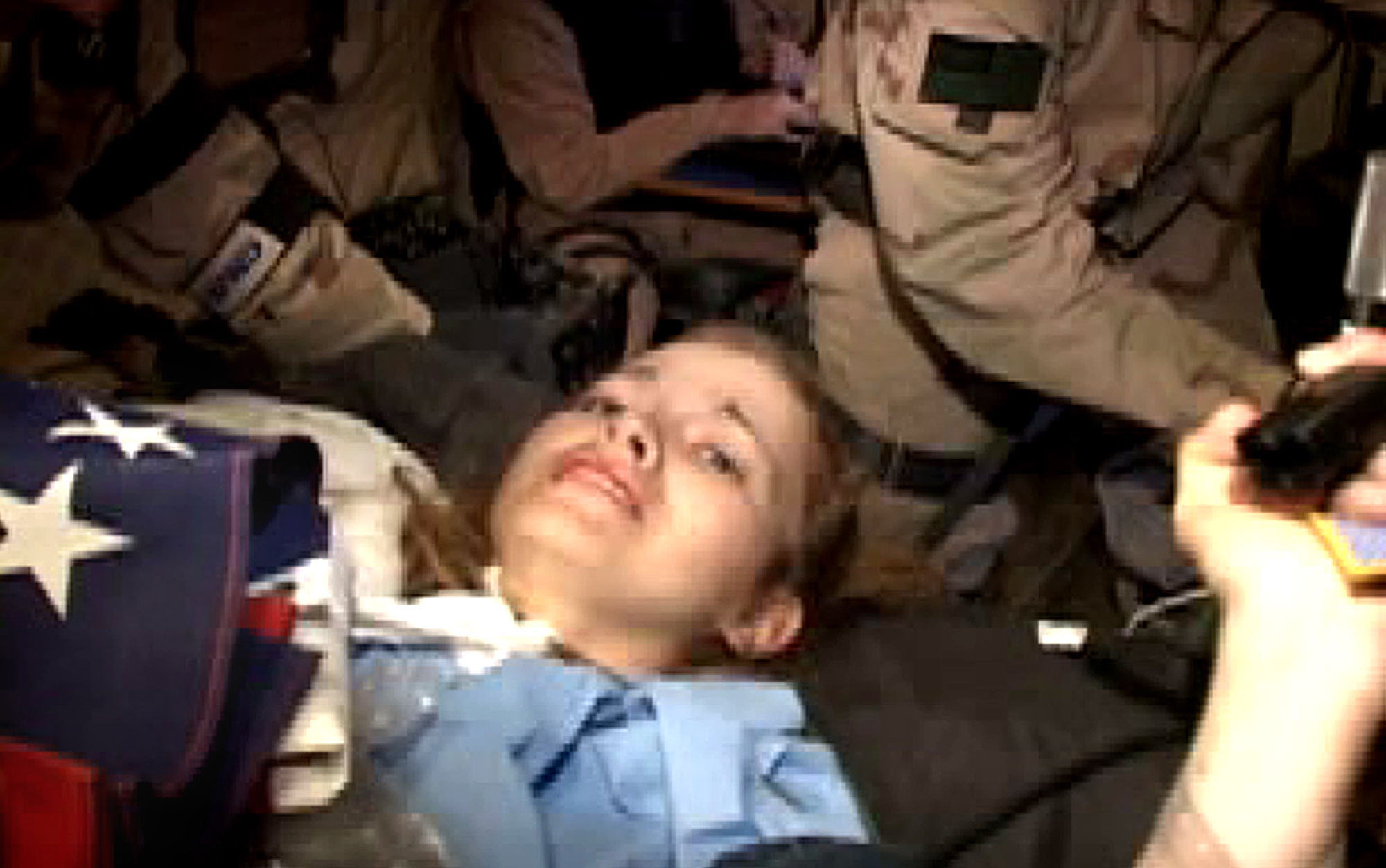 OPERATION IRAQI FREEDOM -- An image from video shown during a U.S. Central Command news conference April 2 shows the rescue of Army Pfc. Jessica Lynch on April 1.(Department of Defense image)