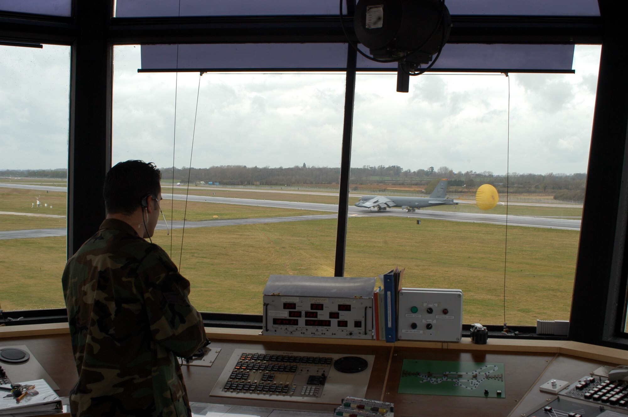 OPERATION IRAQI FREEDOM -- Air traffic controller Senior Airman Steve Haro directs the crew of a B-52 Stratofortress shortly after the aircraft landed at a forward-deployed location supporting Operation Iraqi Freedom.  (U.S. Air Force photo by 2nd Lt. Nathan Broshear)