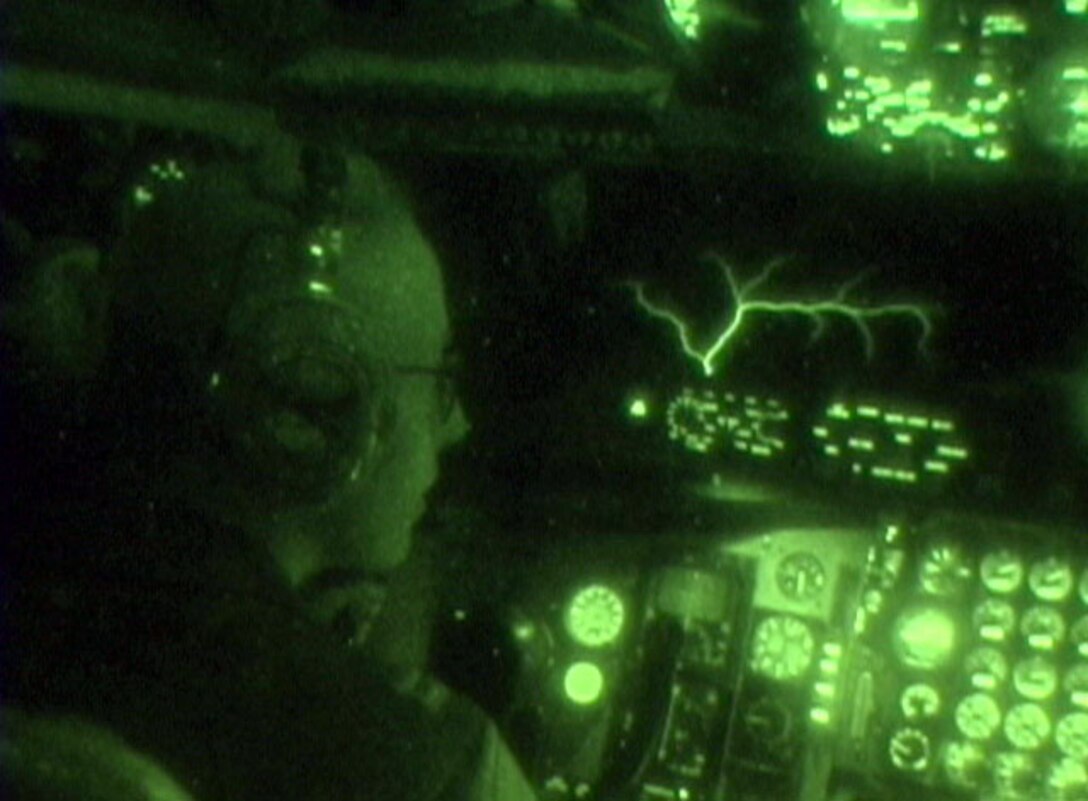 OPERATION IRAQI FREEDOM -- Capt. Rachel Tukey, 28th Expeditionary Air Refueling Squadron, watches a naturally occuring phenomenon known as St. Elmo's Fire on the windshield of her KC-135T Stratotanker after refueling a B-52 Stratofortress. (U.S. Air Force photo by Master Sgt. Timothy Lancaster