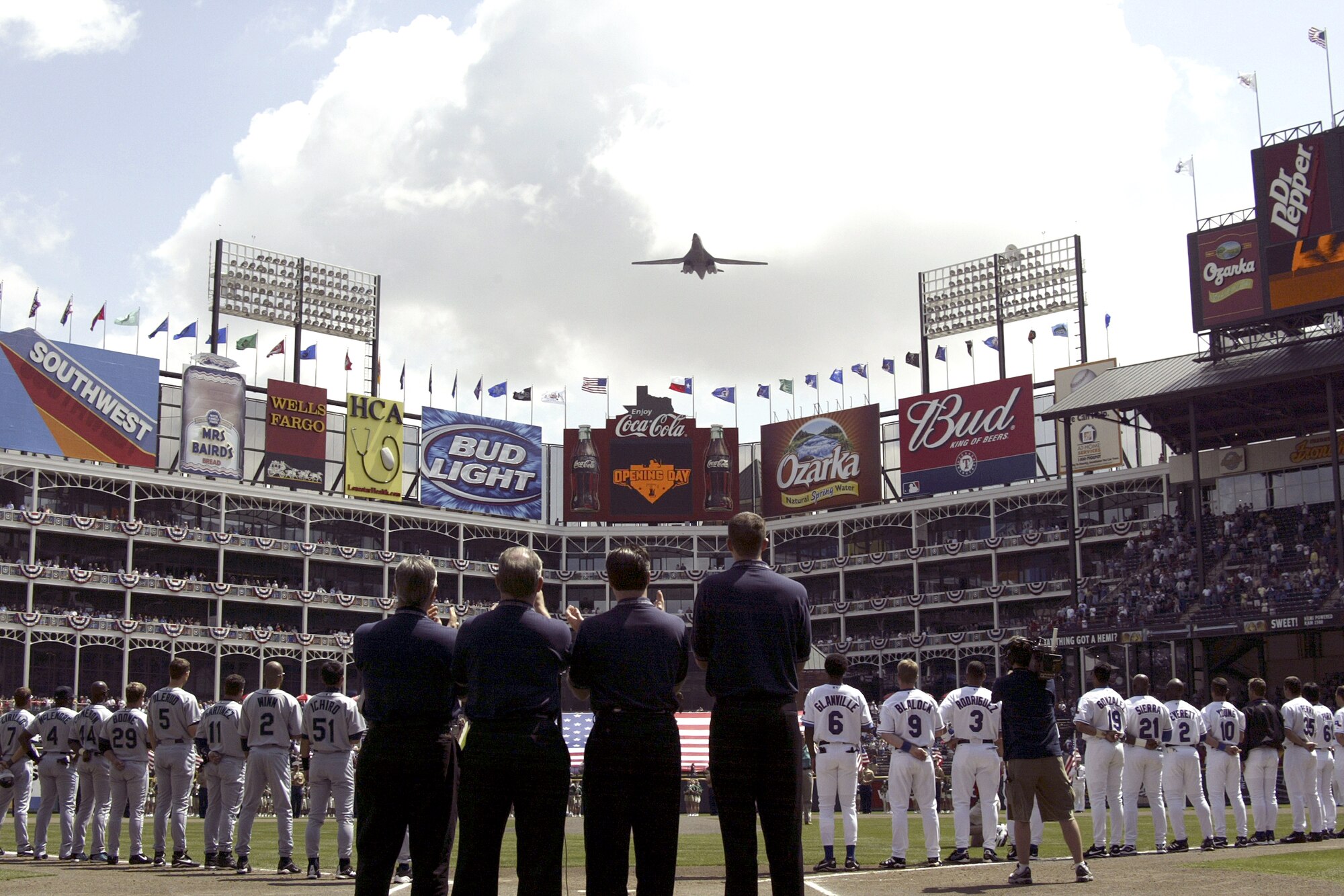 ARLINGTON, Texas -- A B-1B Lancer performs a flyover at the Texas Rangers first season home game here, April 4.  The B-1B was from the 28th Bomb Squadron at Dyess Air Force Base.  The B-1B was flown by Maj. Michael Jackon Jr., pilot, and co-pilot, 1st Lt. Jade Yim and weapons system officers, Capt. Daemon Hobbs and Capt. Scott Koeckritz.  This is the third year Dyess B-1Bs have opened the Rangers season opener at home. (U.S. Air Force photo by Staff Sgt. Adam R. Wooten)  