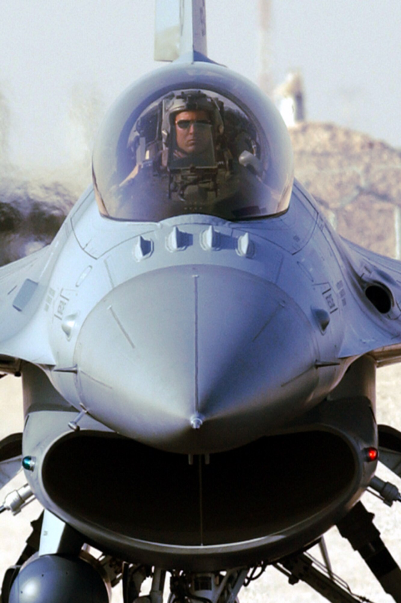 OPERATION IRAQI FREEDOM -- An F-16CJ pilot known as "ABU" assigned to the 157th Expeditionary Fighter Squadron prepares to taxi out on a combat sortie from this forward deployed location in the Gulf region in support of OPERATION IRAQI FREEDOM.  (U.S. Air Force photo by Master Sgt. Terry L. Blevins)
