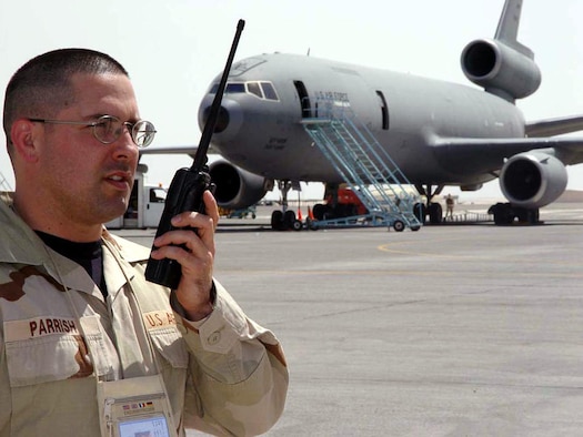 OPERATION IRAQI FREEDOM -- Tech. Sgt. Scott Parrish radios for maintenance assistance during a routine inspection on the flightline at a forward-deployed location. Parrish is chief of airfield management for the 380th Operations Support Squadron and deployed from Altus Air Force Base, Okla. (U.S. Air Force photo by Tech Sgt. Angelique Battle)