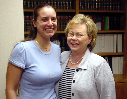 MOODY AIR FORCE BASE, Ga. -- Andrea Evans (left) and Judy Lanier, a Lanier County, Ga. probate court judge pose for a photo at the area defense counsel office here.  Andrea married Senior Airman James Evans by proxy April 8.  James is a security forces airman currently deployed with the 444th Air Expeditionary Group supporting Operation Iraqi Freedom.  (U.S. Air Force photo by Capt. Andy Akridge)