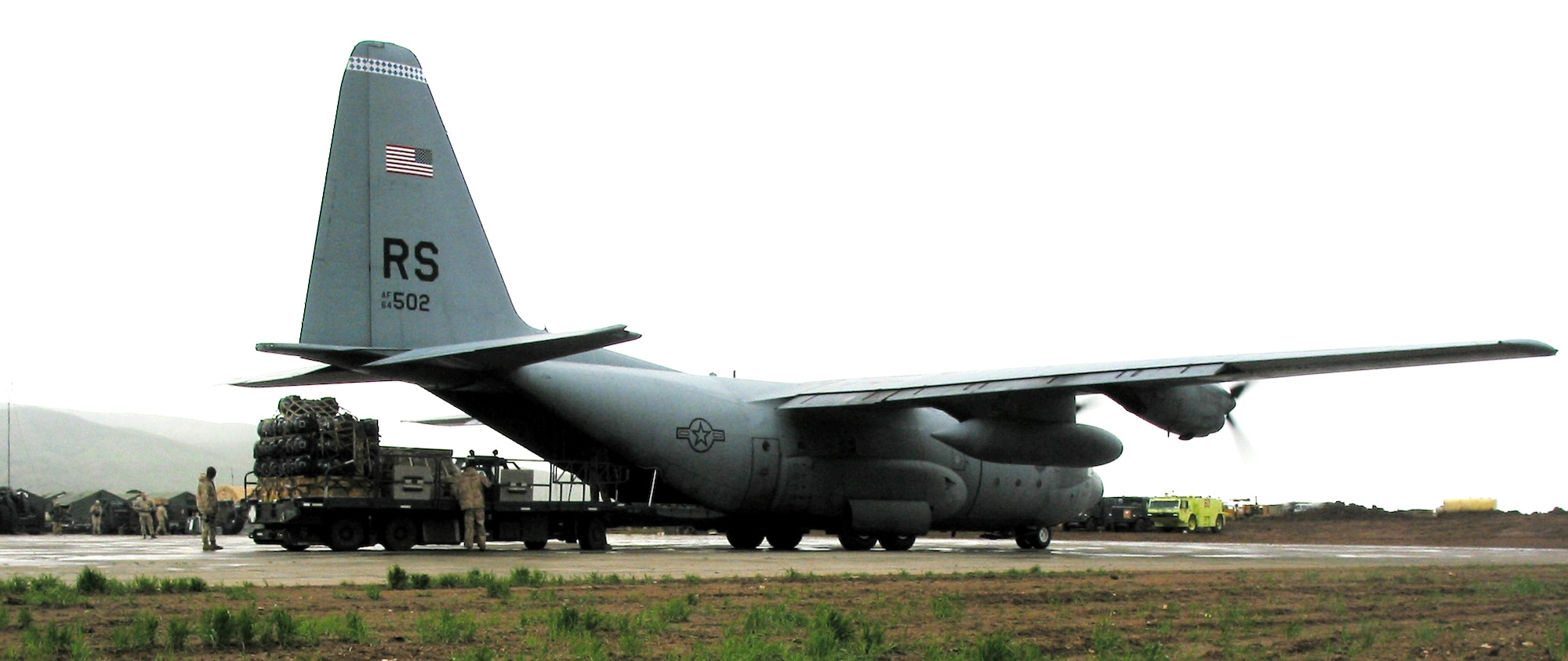 OPERATION IRAQI FREEDOM -- A C-130 Hercules lands at an airfield in northern Iraq on April 8.  The aircraft and crew from the 37th Airlift Squadron at Ramstein Air Base, Germany, delivered more than 14,000 pounds of supplies to support Operation Iraq Freedom.  (U.S. Air Force photo by 1st Lt. Phillip Ulmer)