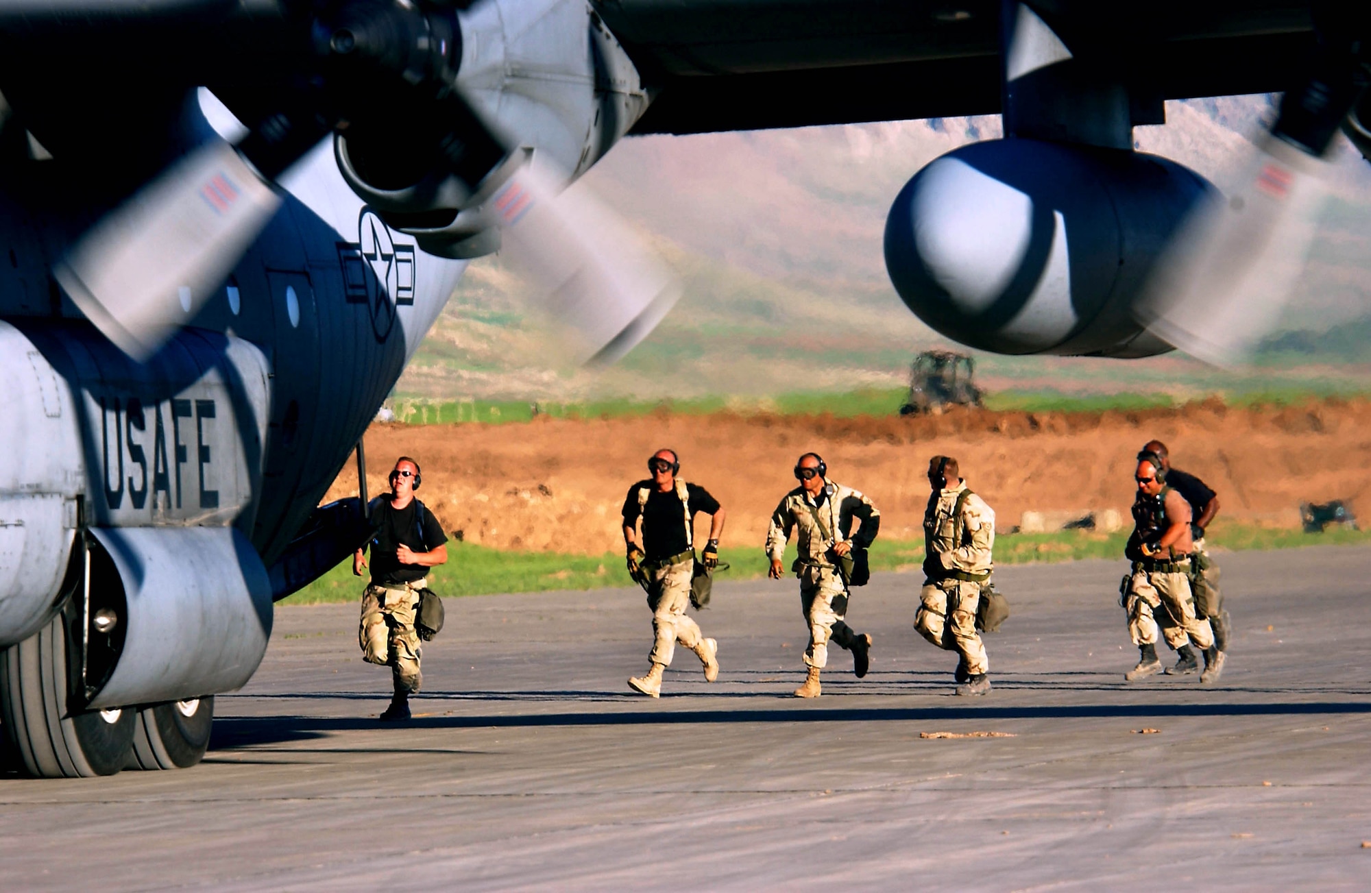 OPERATION IRAQI FREEDOM -- With aircraft landing day and night at Bashur Airfield in northern Iraq, members of the 86th Air Mobility Squadron must stay on the run to offload them quickly.  In the two weeks the airmen have been at the base, they have offloaded more than 10 million pounds of cargo.  (U.S. Air Force photo by Master Sgt. Keith Reed)
