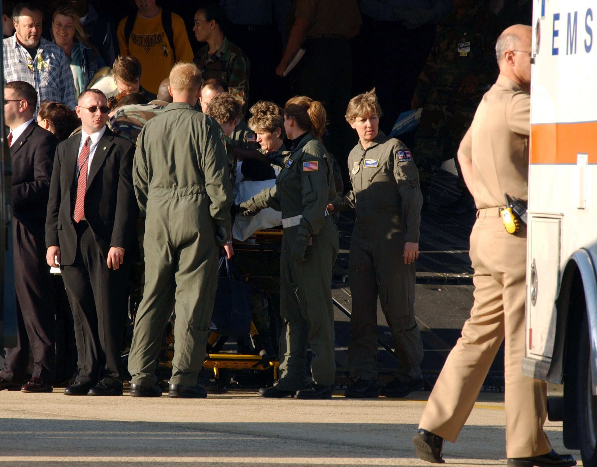 ANDREWS AIR FORCE BASE, Md. -- Army Pfc. Jessica Lynch, a prisoner of war rescued from Iraqi captivity, is carried from a C-17 Globemaster III into an awaiting ambulance here.  The ambulance brought her to nearby Walter Reed Medical Center for further treatment.  (U.S. Air Force Photo by Senior Airman Charity Barrett)