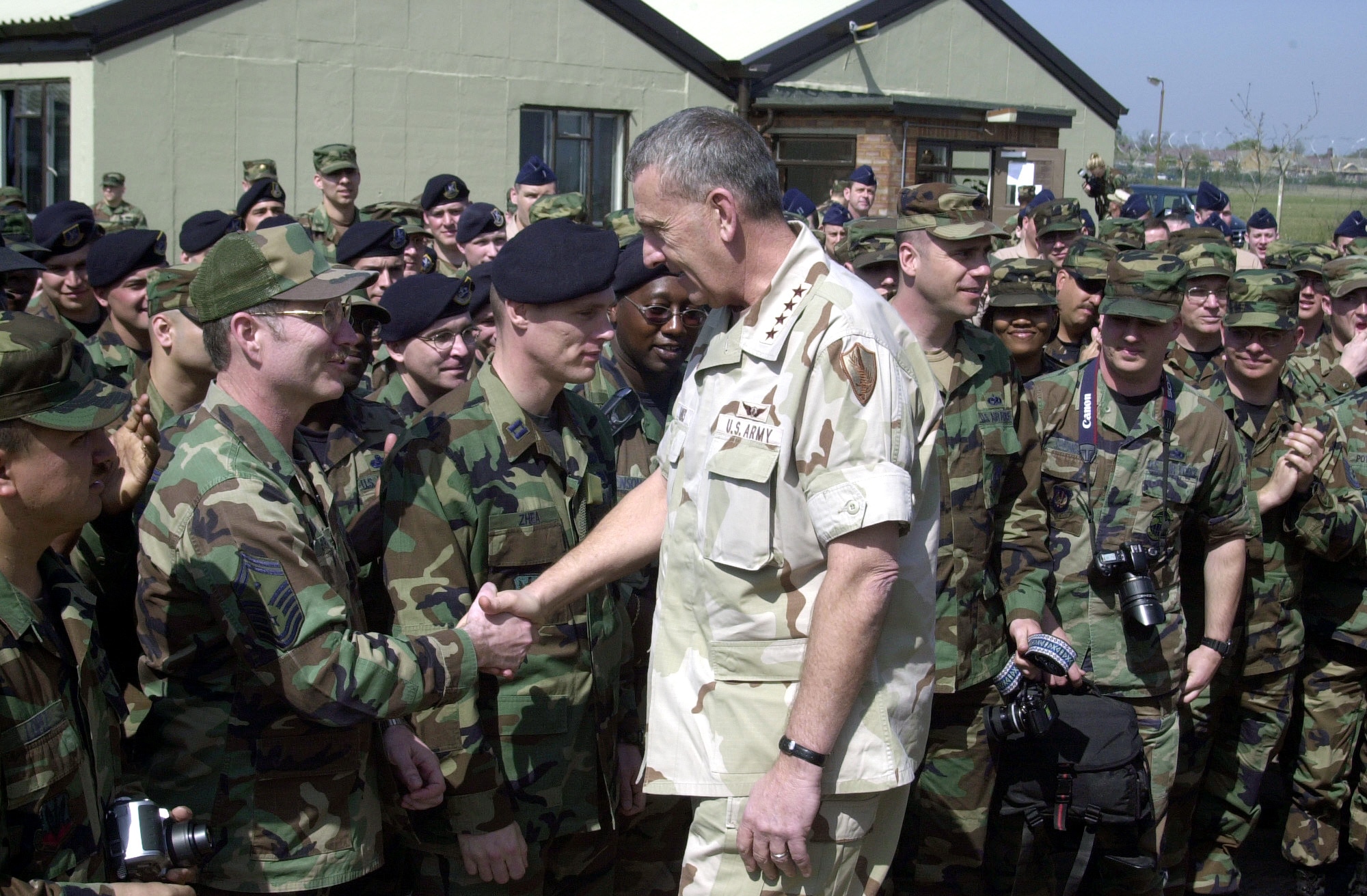 OPERATION IRAQI FREEDOM -- Army Gen. Tommy Franks, commander of U.S. Central Command, visits with airmen of the 457th Air Expeditionary Group during a visit to a forward-deployed bomber location supporting Operation Enduring Freedom.  (U.S. Air Force photo by Master Sgt. Andrew E. Lynch)