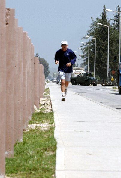 INCIRLIK AIR BASE, Turkey -- Lt. Col. Rod Matte, executive officer to the Operation Northern Watch commanding general, completes his goal of running 1,000 miles while deployed here.  Matte was part of the more than 1,400 British, Turkish and U.S. troops who were deployed to enforce the no-fly zone in northern Iraq.  (U.S. Air Force photo by Airman 1st Class Dallas Edwards)