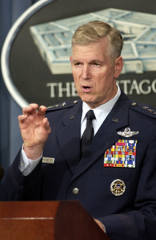 Chairman of the Joint Chiefs of Staff Gen. Richard B. Myers, U.S. Air Force, gestures to make his point as he responds to a reporter's question during a Pentagon press briefing on Aug. 5, 2003. Myers and Secretary of Defense Donald H. Rumsfeld gave reporters an operational update on Operation Iraqi Freedom. 