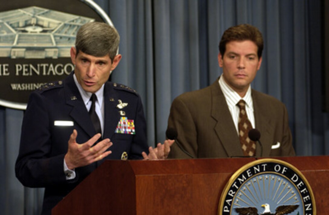 Director for Operations of the Joint Staff, J-3, Lt. Gen. Norton Schwartz, U.S. Air Force, briefs reporters in the Pentagon on Aug. 7, 2003. Schwartz and Special Assistant to the Secretary of Defense Lawrence Di Rita briefed reporters on the coalition's progress in Iraq. 