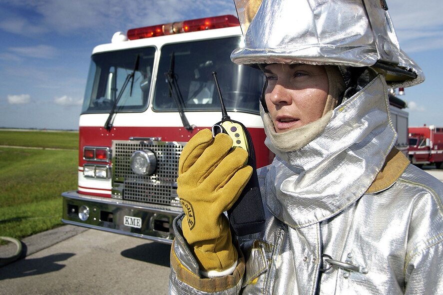 PATRICK AIR FORCE BASE, Fla. -- Staff Sgt. Suzanne Blundell, a 45th Civil Engineer Squadron firefighter, radios in to other firefighters during a training exercise.  Blundell is the only female firefighter at the base fire station.  (U.S. Air Force photo by Jim Laviska)