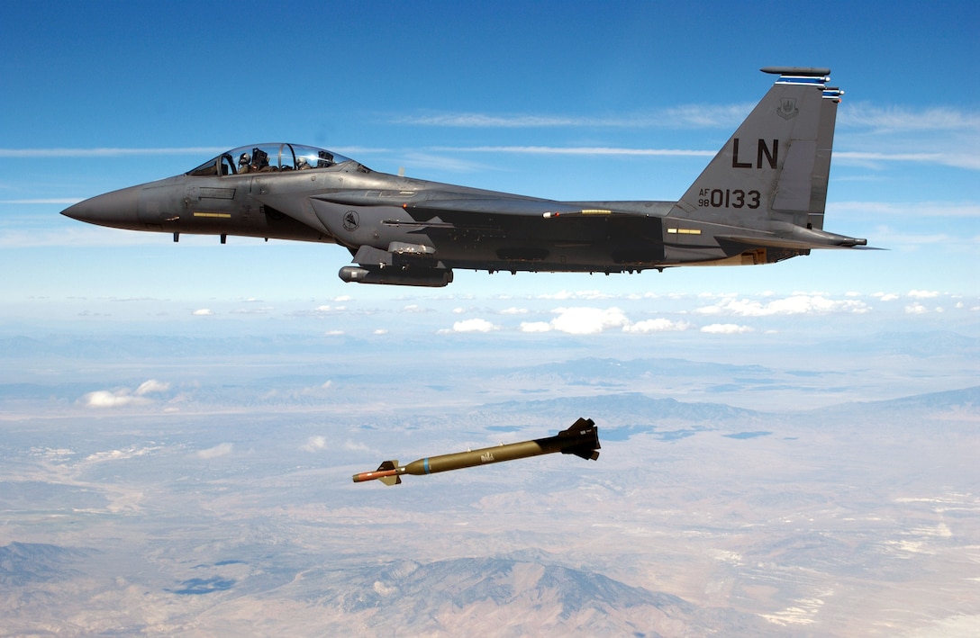 HILL AIR FORCE BASE, Utah  --  An F-15E Strike Eagle deployed from the 492nd Fighter Squadron, Royal Air Force Lakenheath, England, releases a GBU-28 "Bunker Buster" laser-guided bomb. The 492nd deployed here for the Air-to-Ground Weapons System Evaluation Program mission commonly known as Combat Hammer. The GBU-28 was designed and first used during the Perisan Gulf War in 1991 to destroy hardened targets such as bunkers and undergorund command centers.  (U.S. Air Force photo by Tech. Sgt. Michael Ammons)