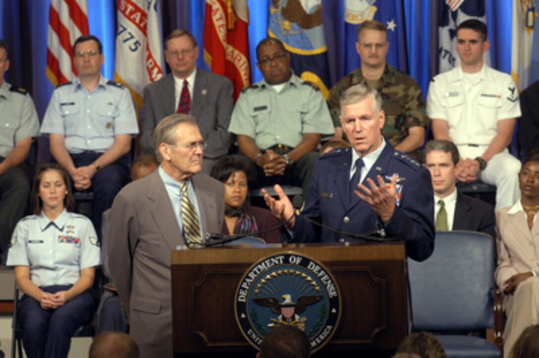 Chairman of the Joint Chiefs of Staff Gen. Richard B. Myers, U.S. Air Force, answers a question from the audience at a town hall meeting in the Pentagon auditorium on Aug. 14, 2003. Myers and Secretary of Defense Donald H. Rumsfeld delivered opening remarks then fielded questions from military and civilian Pentagon employees. The forum allows people in the Pentagon to direct their questions to the leadership at the Defense Department. 