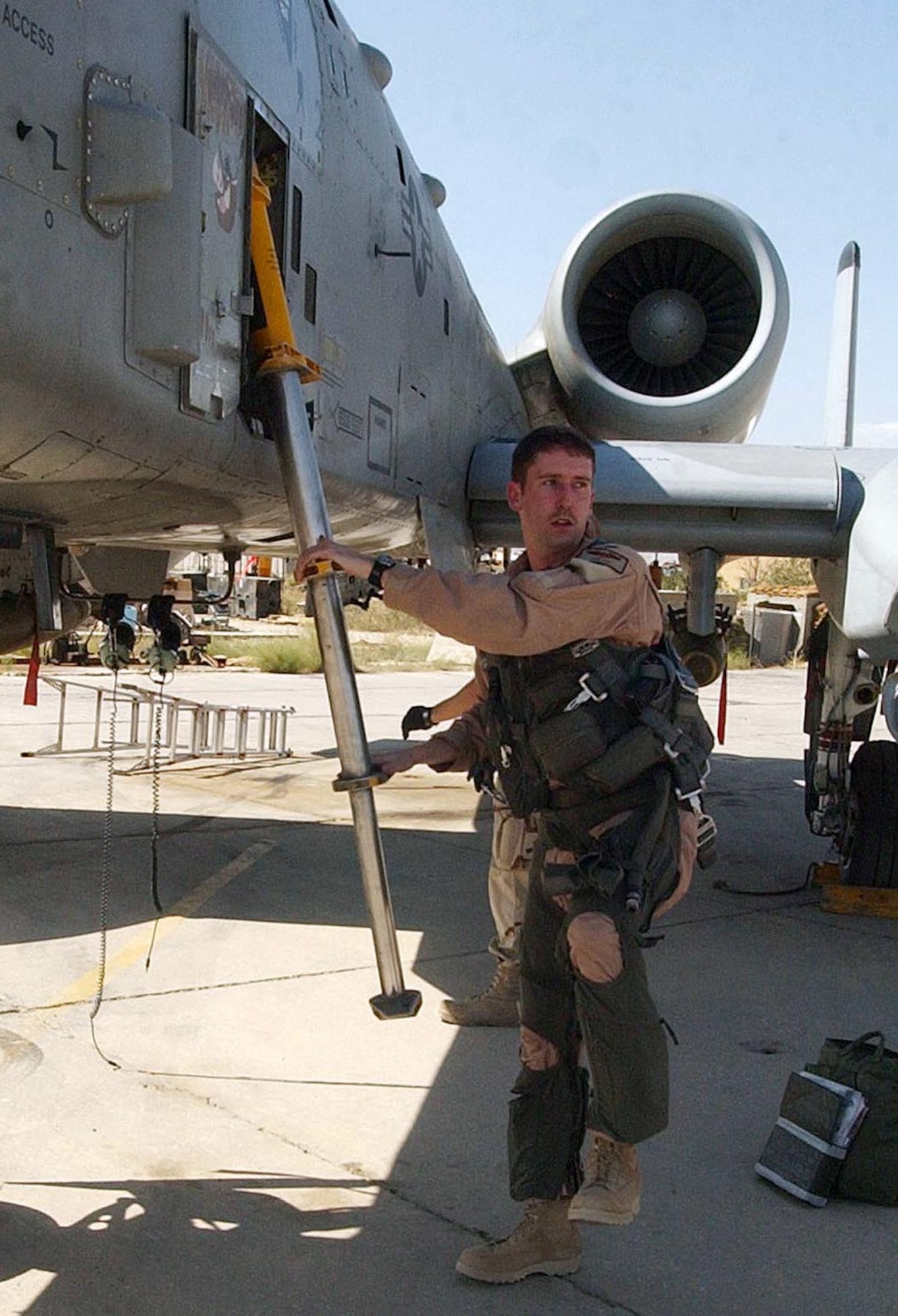 BAGRAM AIR BASE, Afghanistan  -- First Lt. Erik Axt, 81st Expeditionary Fighter Squadron, emerges from his A-10 Thunderbolt II after flying a mission here Aug. 14 supporting Operation Enduring Freedom.  (U.S. Air Force photo by Staff Sgt. Russell Wicke)