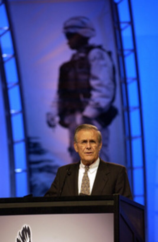 Secretary of Defense Donald H. Rumsfeld addresses over 15,000 delegates from the Veterans of Foreign Wars at the joint opening of the organization's 104th national convention in San Antonio, Texas, on Aug. 25, 2003. 