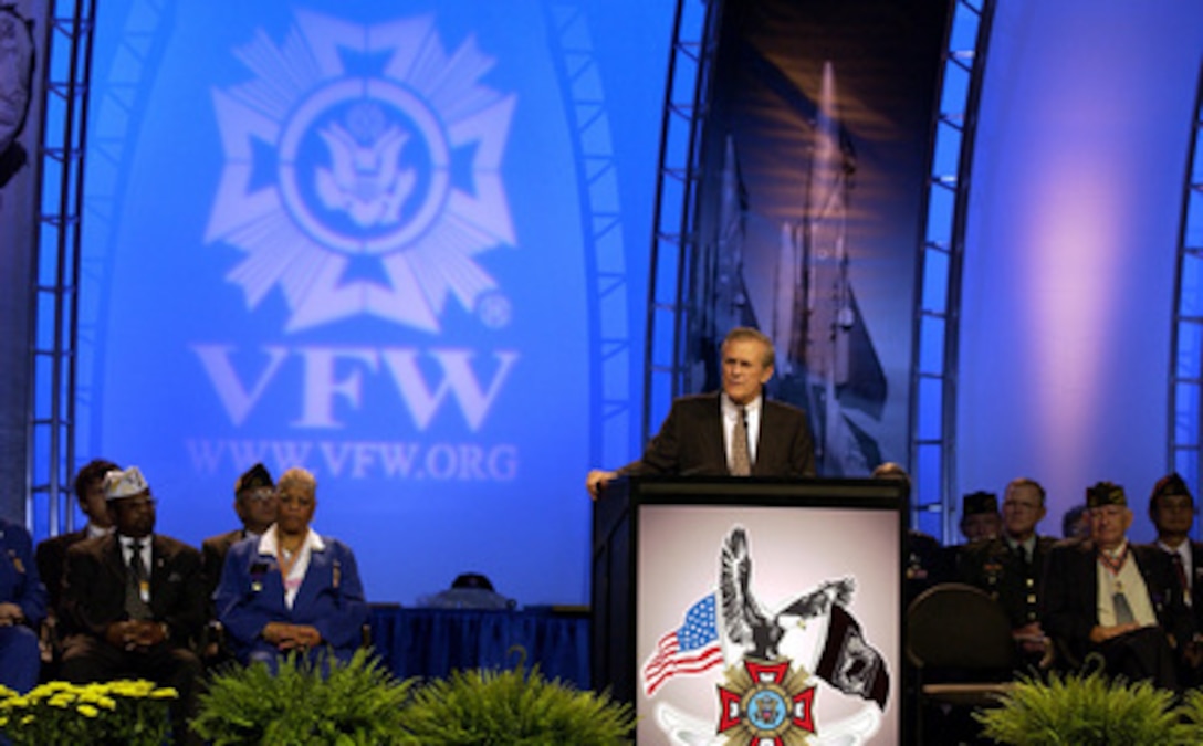 Secretary of Defense Donald H. Rumsfeld addresses over 15,000 delegates from the Veterans of Foreign Wars at the joint opening of the organization's 104th national convention in San Antonio, Texas, on Aug. 25, 2003. 