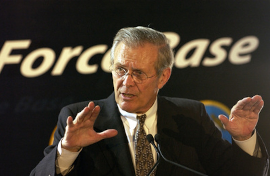 Secretary of Defense Donald H. Rumsfeld responds to a reporter's question during a press conference at Lackland Air Force Base, San Antonio, Texas, on Aug. 25, 2003. Rumsfeld met with members of the press after a town hall meeting where he delivered his opening remarks then fielded questions from military and civilian attendees. 