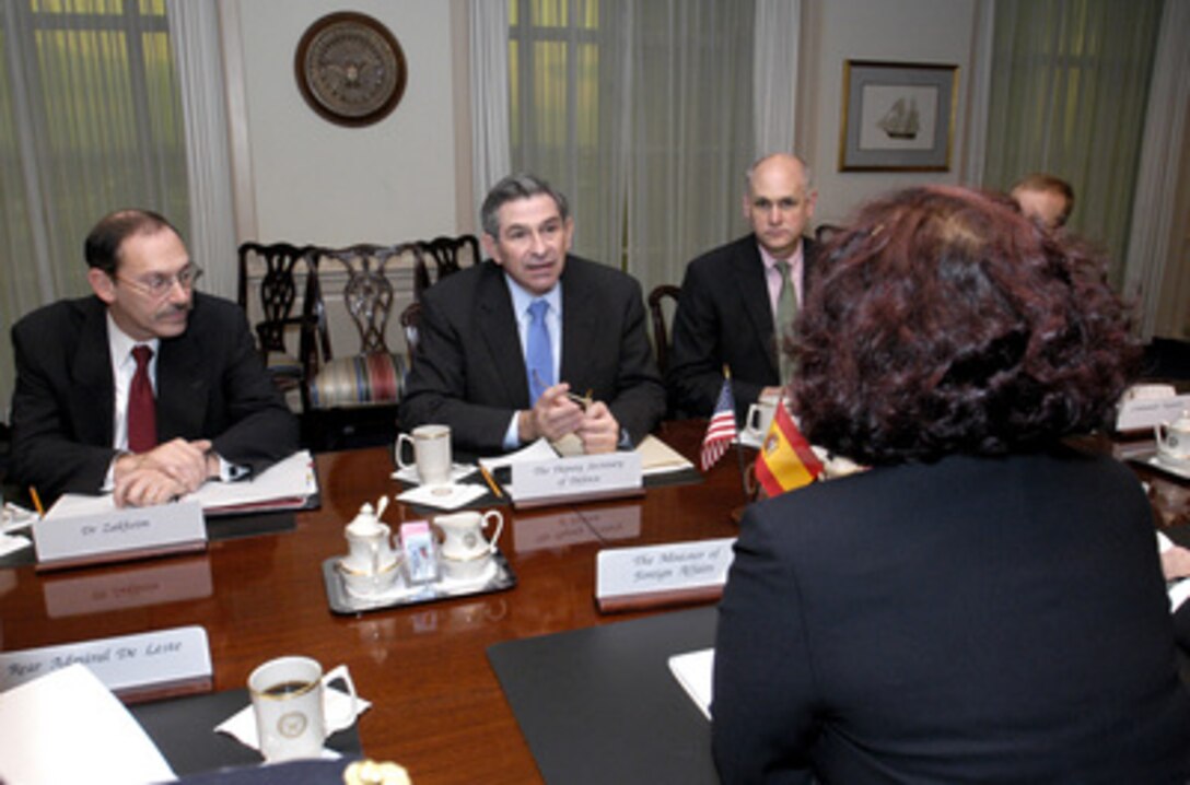 Deputy Secretary of Defense Paul Wolfowitz (center) hosts a meeting in the Pentagon on Dec. 1, 2003, with Spanish Minister of Foreign Affairs Ana De Palacio (foreground) to discuss the coalition's efforts in Iraq. Flanking Wolfowitz are Under Secretary of Defense Comptroller Dov Zakheim (left) and Director for NATO Policy Jim Townsend (right). 