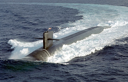 The U.S. Navy&#39;s nuclear ballistic submarine USS MAINE (SSBN -41) one of the nations newest Ohio class submarines, conducts surface navigational operations approximately 50 miles due south of Naval Station Roosevelt Roads, Puerto Rico.