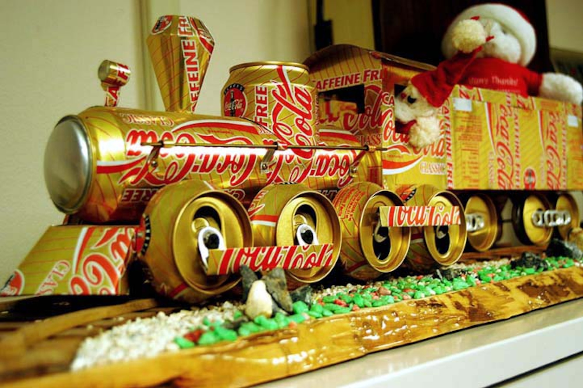 ANDREWS AIR FORCE BASE, Md. -- A train made of cans adorns the office of Helen Walker who makes a variety of sculptures using recycled materials.  She is the 89th Civil Engineer Squadron's maintenance flight quality assurance evaluator.  (U.S. Air Force photo by Bobby Jones)