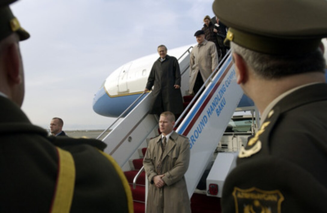 Secretary of Defense Donald H. Rumsfeld arrives in Baku, Azerbaijan, on Dec. 3, 2003. Rumsfeld is in Baku for bilateral talks with President Ilham Aliyev and Defense Minister Col. Gen. Safar Abiyev. 