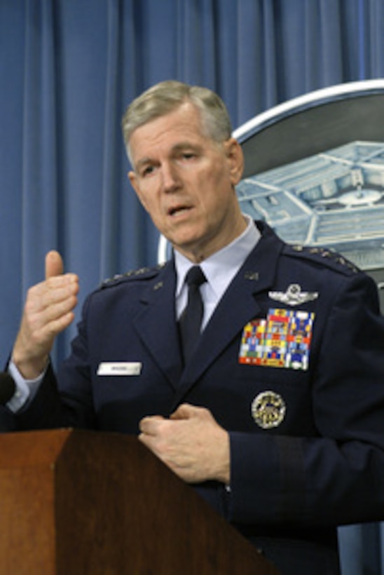 Chairman of the Joint Chiefs of Staff Gen. Richard B. Myers, U.S. Air Force, responds to a reporter's question during the Pentagon press briefing on Dec. 9, 2003. Myers and Secretary of Defense Donald H. Rumsfeld updated reporters on the progress of the Iraqi security forces training and the coalitions' efforts in Iraq. 