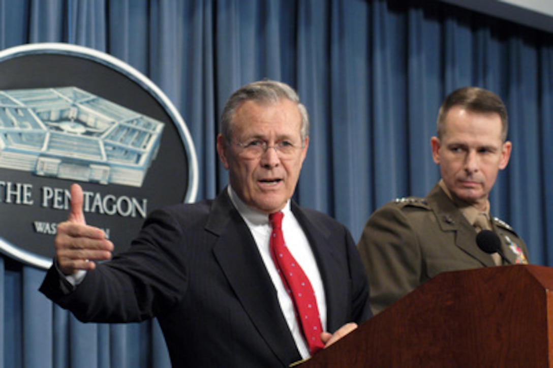 Secretary of Defense Donald Rumsfeld explains the difficulty in capturing Saddam Hussein to reporters during a Pentagon press conference on Dec. 16, 2003. Rumsfeld and Vice Chairman of the Joint Chiefs of Staff Gen. Peter Pace, U.S. Marine Corps, updated reporters with the latest information on the December 13th discovery and capture of Saddam by the U.S Army's 4th Infantry Division, U.S. Special Operations forces and coalition troops. 