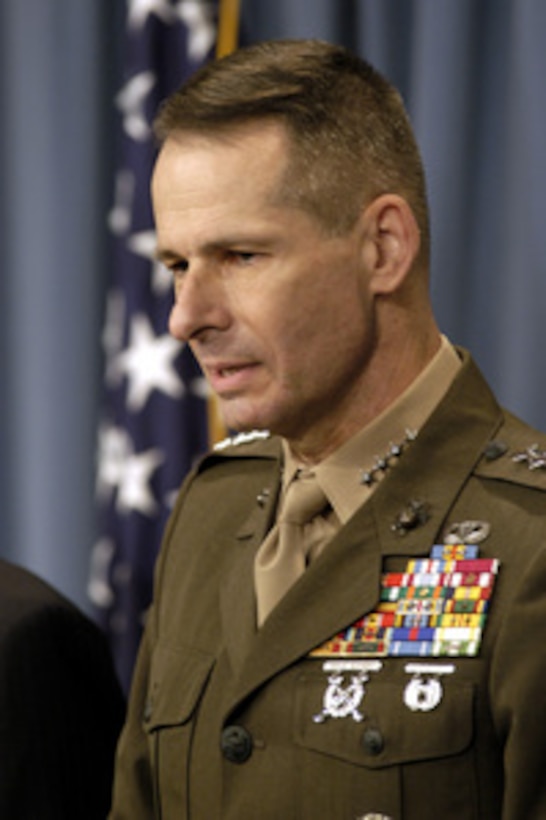 Vice Chairman of the Joint Chiefs of Staff Gen. Peter Pace, U.S. Marine Corps, responds to a reporter's question concerning the discovery and capture of Saddam Hussein near Tikrit, Iraq, during a Pentagon press conference on Dec. 16, 2003. Pace and Secretary of Defense Donald H. Rumsfeld updated reporters with the latest information on the December 13th capture of Saddam by the U.S Army's 4th Infantry Division, U.S. Special Operations forces and coalition troops. 