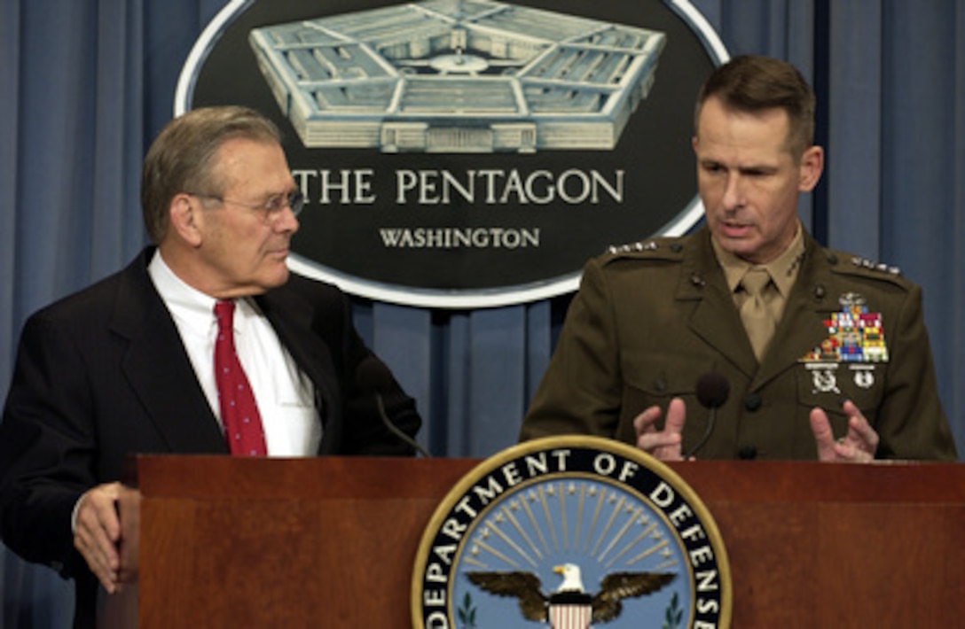 Vice Chairman of the Joint Chiefs of Staff Gen. Peter Pace, U.S. Marine Corps, responds to a reporter's question concerning the discovery and capture of Saddam Hussein near Tikrit, Iraq, during a Pentagon press conference on Dec. 16, 2003. Pace and Secretary of Defense Donald H. Rumsfeld updated reporters with the latest information on the December 13th capture of Saddam by the U.S Army's 4th Infantry Division, U.S. Special Operations forces and coalition troops. 