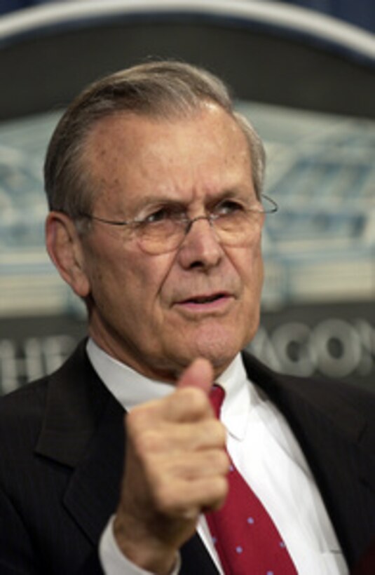 Secretary of Defense Donald H. Rumsfeld responds to a reporter's question during a Pentagon press briefing on Dec. 16, 2003. Rumsfeld and Vice Chairman of the Joint Chiefs of Staff Gen. Peter Pace, U.S. Marine Corps, updated reporters with the latest information on the December 13th discovery and capture of Saddam by the U.S Army's 4th Infantry Division, U.S. Special Operations forces and coalition troops. 