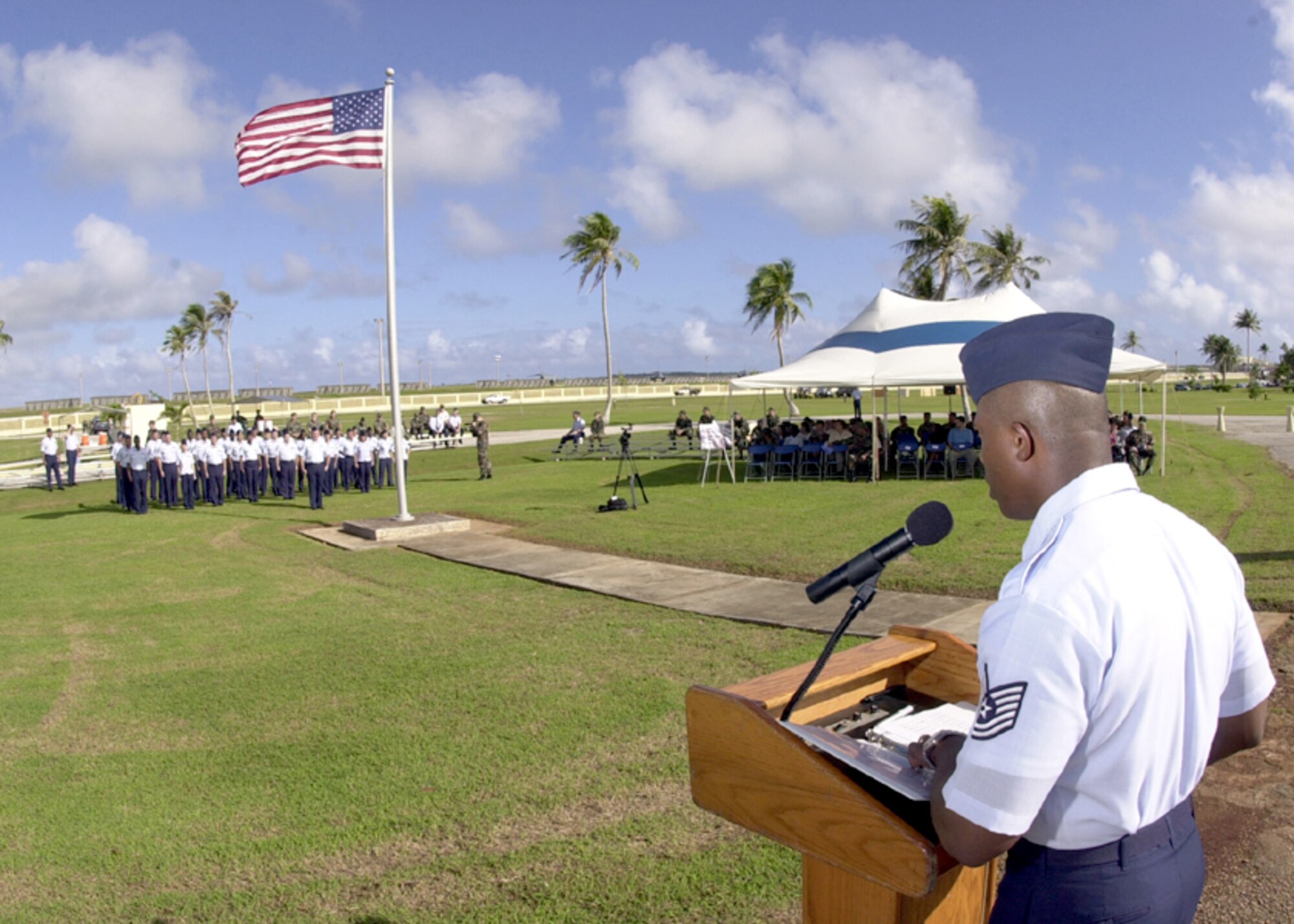 ANDERSEN AIR FORCE BASE, Guam -- Tech. Sgt. John Lester reads the names of the 33 airmen killed during the Linebacker II campaign as part of a ceremony here Dec. 18.  As each name is read, an airman of Andersen's Network 56 organization in the formation comes to attention to represent that person.  Lester is assigned to the 36th Mission Support Squadron.  (U.S. Air Force photo by Senior Airman Joshua Strang)