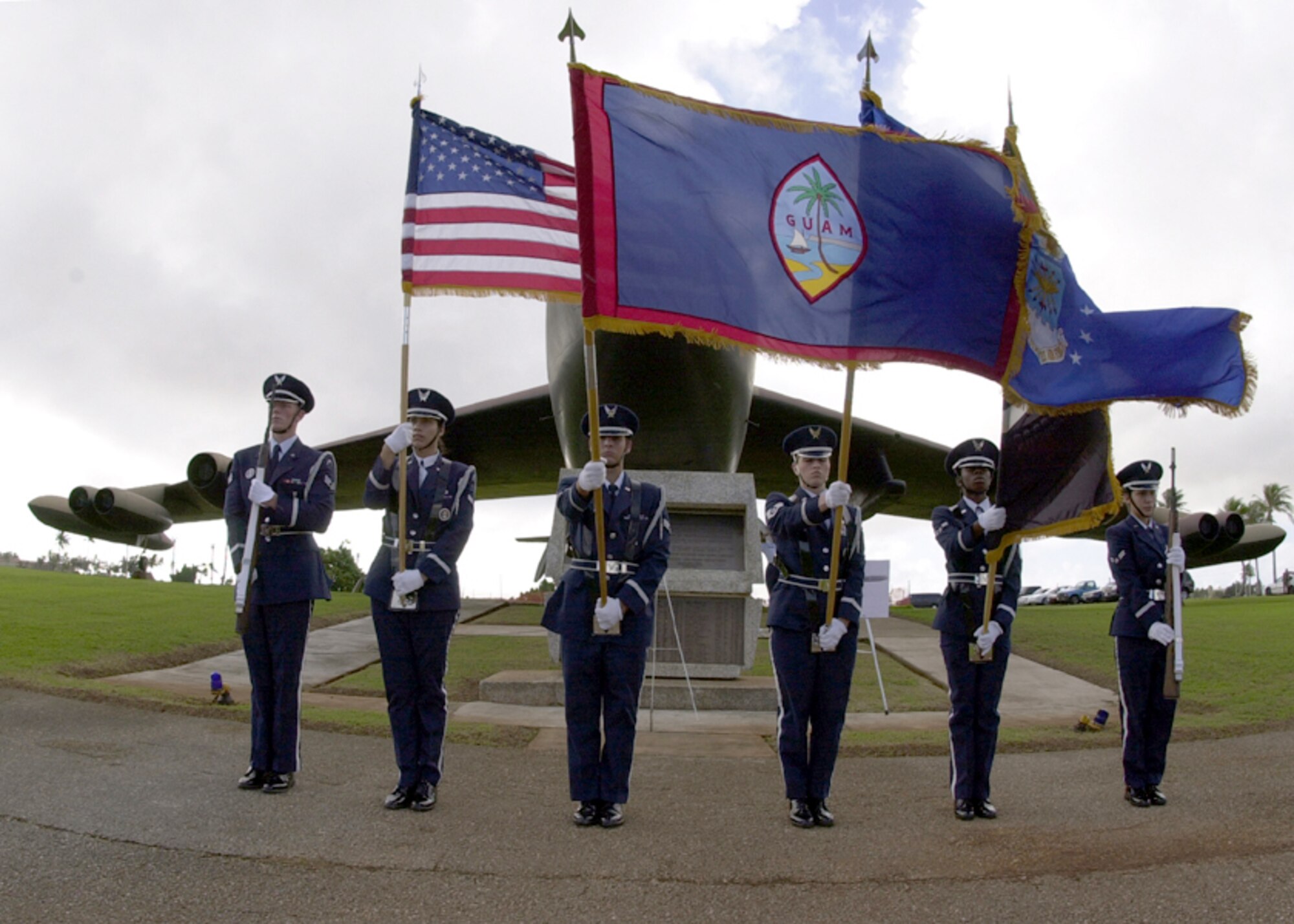 ANDERSEN AIR FORCE BASE, Guam -- Airmen of the Andersen Blue Knights Honor Guard present the flags while "The Star-Spangled Banner" is sung during the Linebacker II ceremony here Dec. 18.  (U.S. Air Force photo by Senior Airman Joshua Strang)