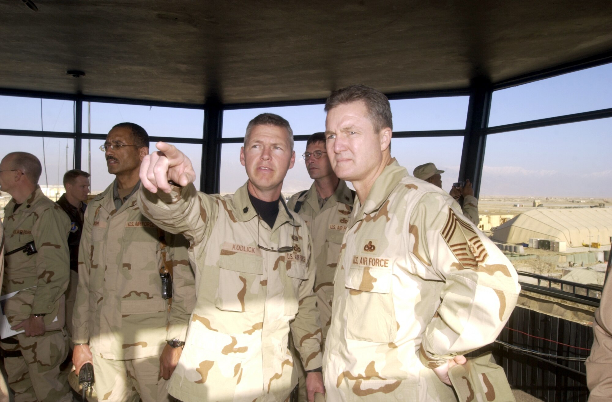 BAGRAM AIR BASE, Afghanistan -- Lt. Col. Les Kodlick shows Chief Master Sgt. of the Air Force Gerald R. Murray some improvements to the airfield from the control tower here.  Murray and Gen. John P. Jumper, Air Force chief of staff, visited the base Dec. 19.  Kodlick is the 455th Expeditionary Support Squadron commander.  (U.S. Air Force photo by Tech. Sgt. Brian Davidson)