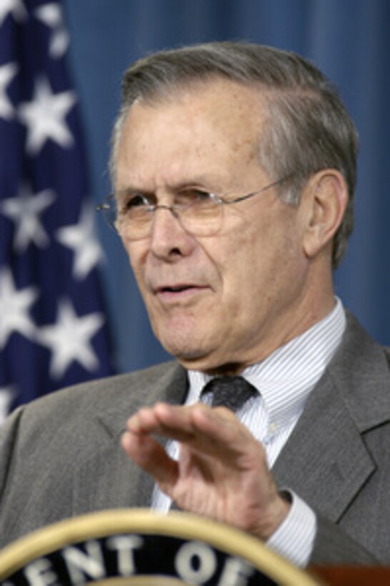 Secretary of Defense Donald H. Rumsfeld answers a reporter's question on the anthrax vaccination program during a Pentagon press briefing on Dec. 23, 2003. The Department is currently reviewing a preliminary injunction recently granted by the U.S. District Court for the District of Columbia regarding the department's anthrax vaccination program. The Department will stop giving anthrax vaccinations until the legal situation is clarified. 