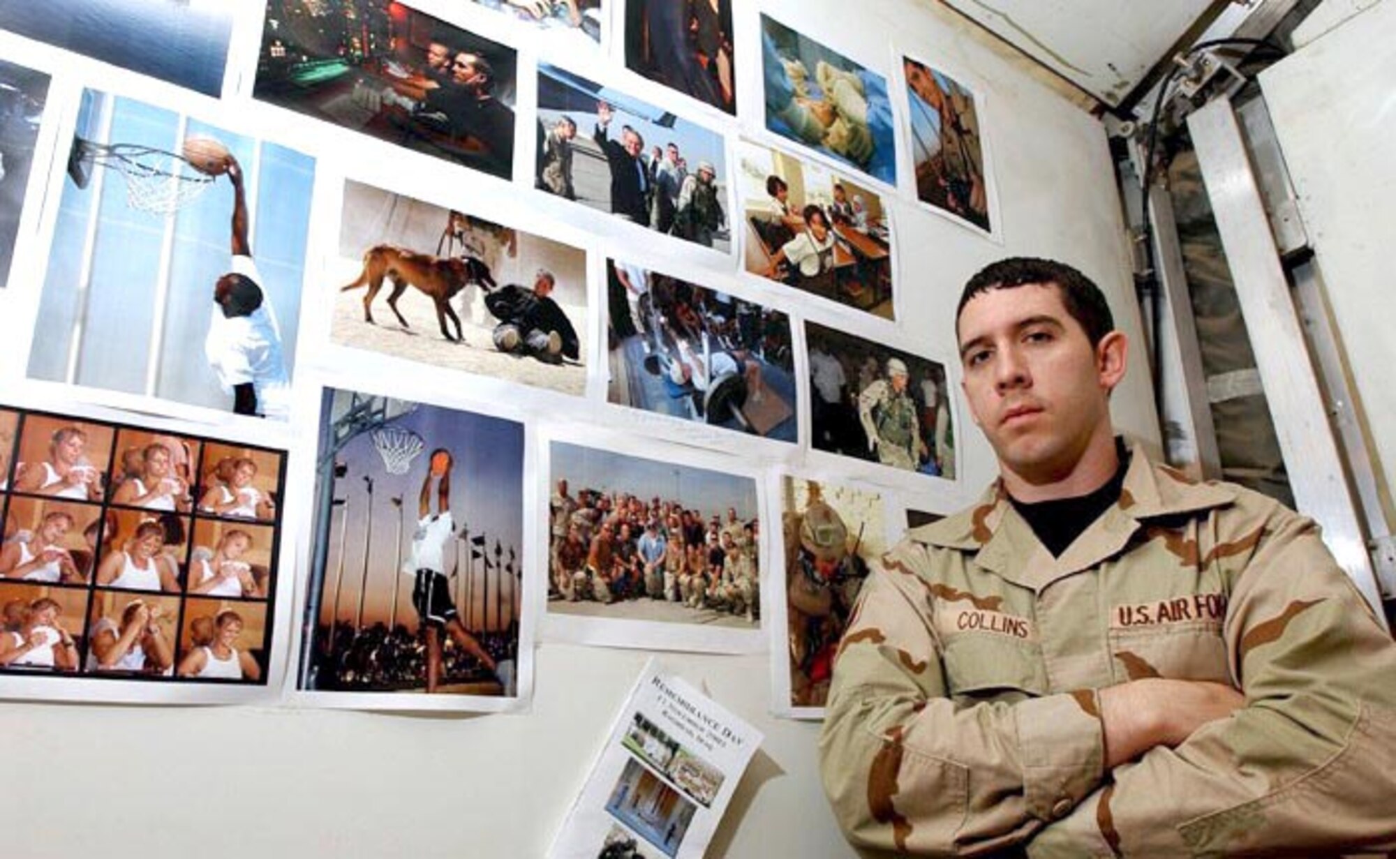 BAGHDAD, Iraq -- Staff Sgt. Levi Collins displays some of the visual information staff's work at Baghdad International Airport.  Photographers have taken more than 5,000 photos since arriving here in late October.  More than 239 of those images have been sent to the Joint Combat Camera Center at the Pentagon, where they are made available to the public.  Collins is a photographer with the 447th Expeditionary Communications Squadron.  (Courtesy photo)