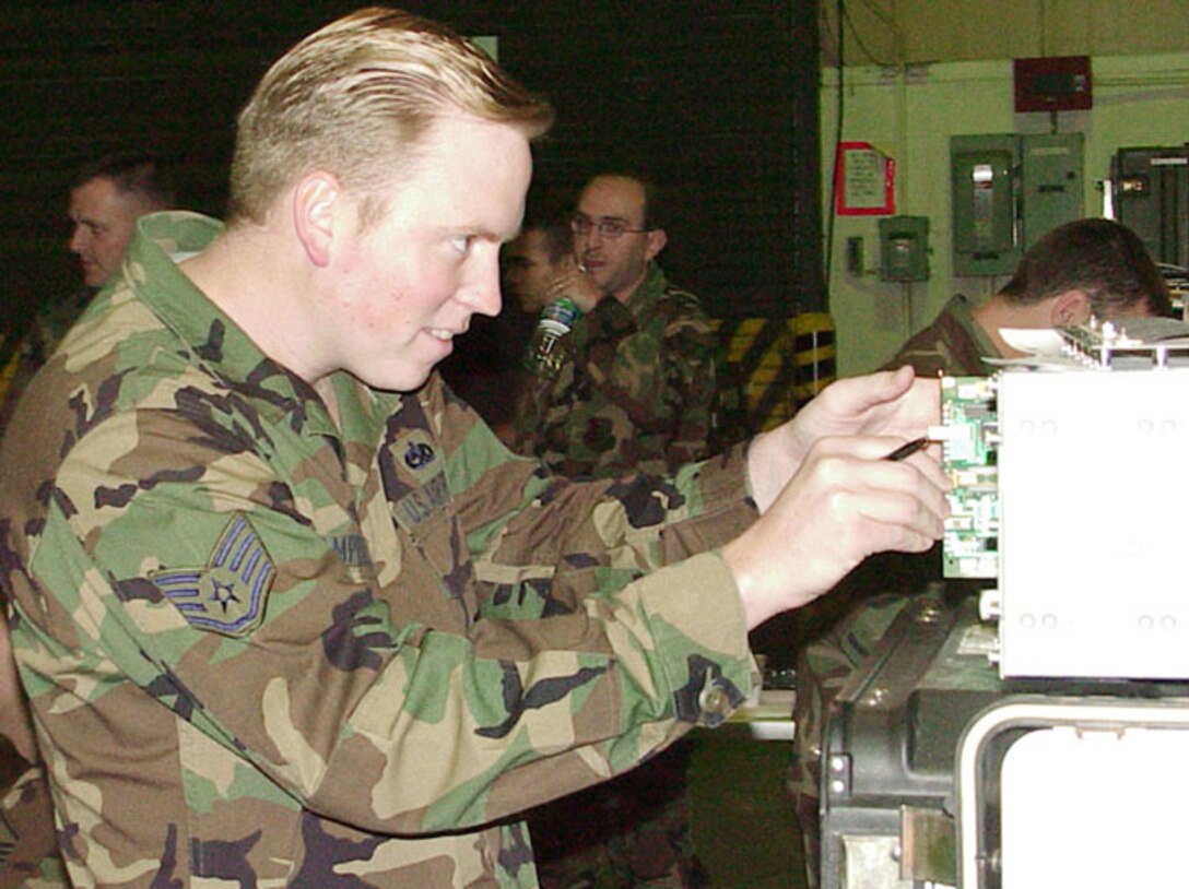 ROBINS AIR FORCE BASE, Ga. -- Staff Sgt. John McCampbell, from the 28th Communications Squadron Ellsworth Air Force Base, S.D., was learning the ins and outs of the new Theater-Deployable Communications equipment package during a two-week hands-on course here. (U.S. Air Force photo by Tech. Sgt. Andrew Gates)