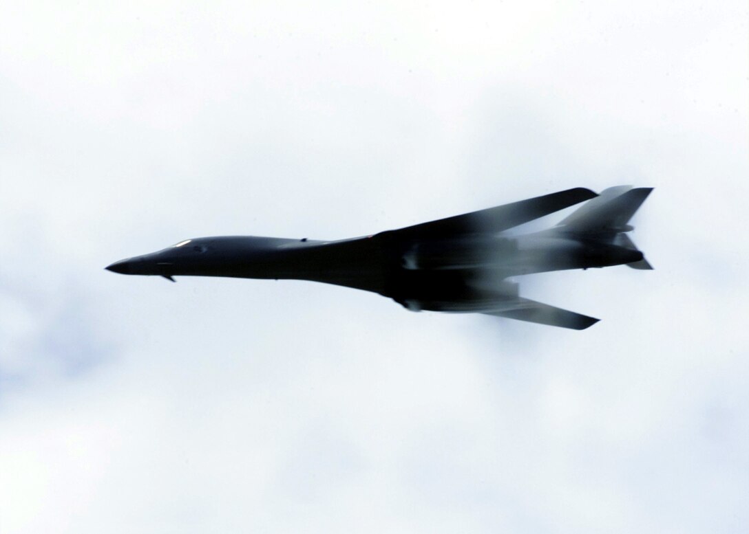 OPERATION ENDURING FREEDOM -- A B-1B Lancer performs a low-level fly-by for troops deployed for Operation Enduring Freedom on Oct. 27. The B-1B's three internal weapons bays can accommodate up to 84 MK-82 general purpose bombs or MK-62 naval mines, 30 CBU-87/89 cluster munitions or CBU-97 Sensor Fused Weapons. (U.S. Air Force photo by Senior Airman Rebeca M. Luquin) 