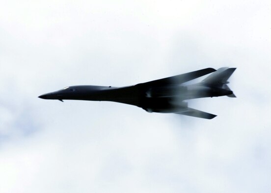 OPERATION ENDURING FREEDOM -- A B-1B Lancer performs a low-level fly-by for troops deployed for Operation Enduring Freedom on Oct. 27. The B-1B's three internal weapons bays can accommodate up to 84 MK-82 general purpose bombs or MK-62 naval mines, 30 CBU-87/89 cluster munitions or CBU-97 Sensor Fused Weapons. (U.S. Air Force photo by Senior Airman Rebeca M. Luquin) 
