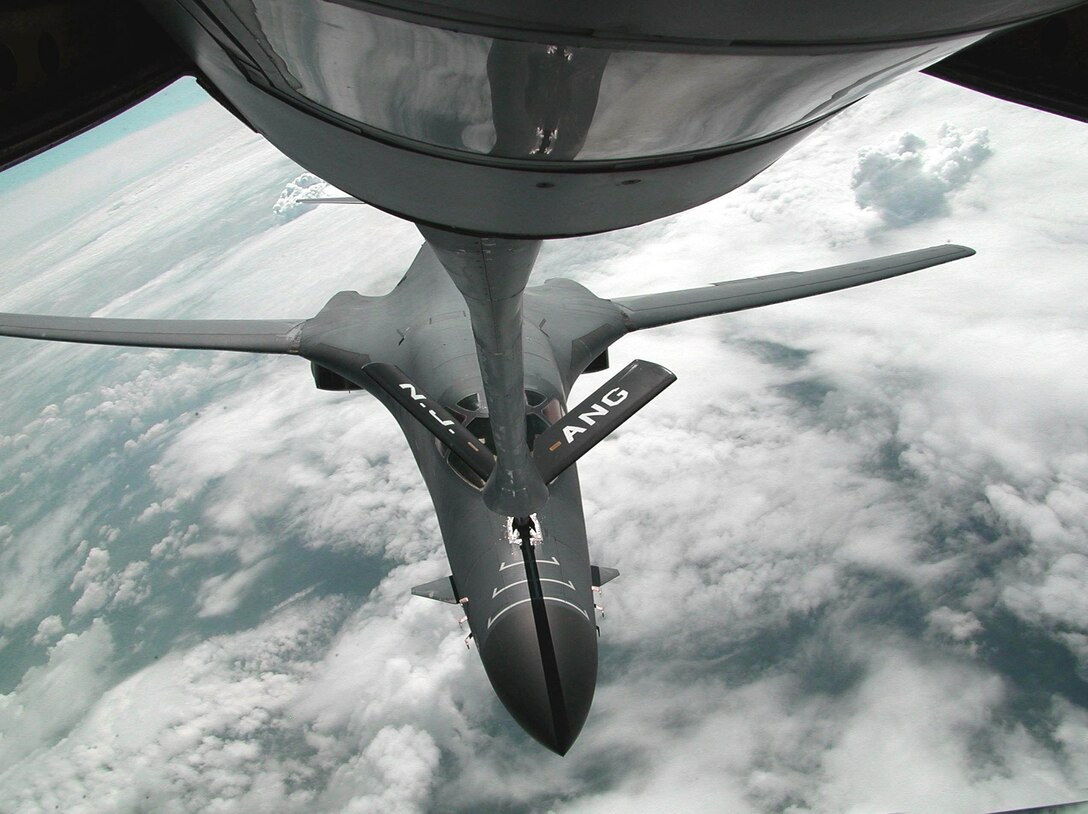 ISTRES, France -- A B-1B Lancer bomber is refueled over France by a KC-135 Stratotanker from the 108th Air Refueling Wing, McGuire Air Force Base, N.J., New Jersey Air National Guard. The B-1 is assigned to the Kansas Air National Guard's 184th Bomb Wing, McConnell Air Force Base, Kan. The B-1 filled its tanks for the flight home from Istres, where it was on display at the French Air Base 25's Istres Air Show May 20. The KC-135 is temporarily assigned to the 16th Expeditionary Operations Group, a small U.S. Air Force detachment located on the French base. (U.S. Air Force photo by Master Sgt. Kenneth Fidler)