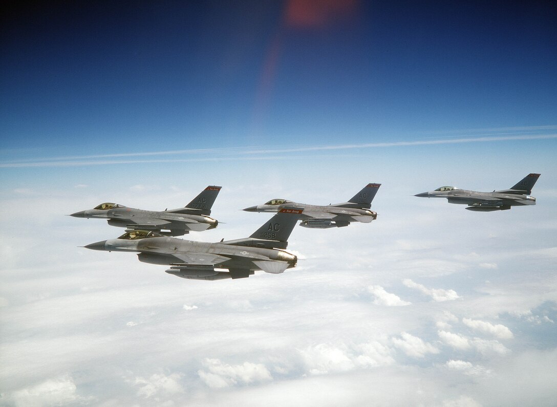 FILE PHOTO --  A formation F-16C Fighting Falcons on a flight from Tyndall Air Force Base, Fla., to Atlantic City International Airport, N.J. The F-16 Fighting Falcon is a compact, multi-role fighter aircraft. It is highly maneuverable and has proven itself in air-to-air combat and air-to-surface attack. It provides a relatively low-cost, high-performance weapon system for the United States and allied nations. (U.S. Air Force photo by Master Sgt. Don Taggart)