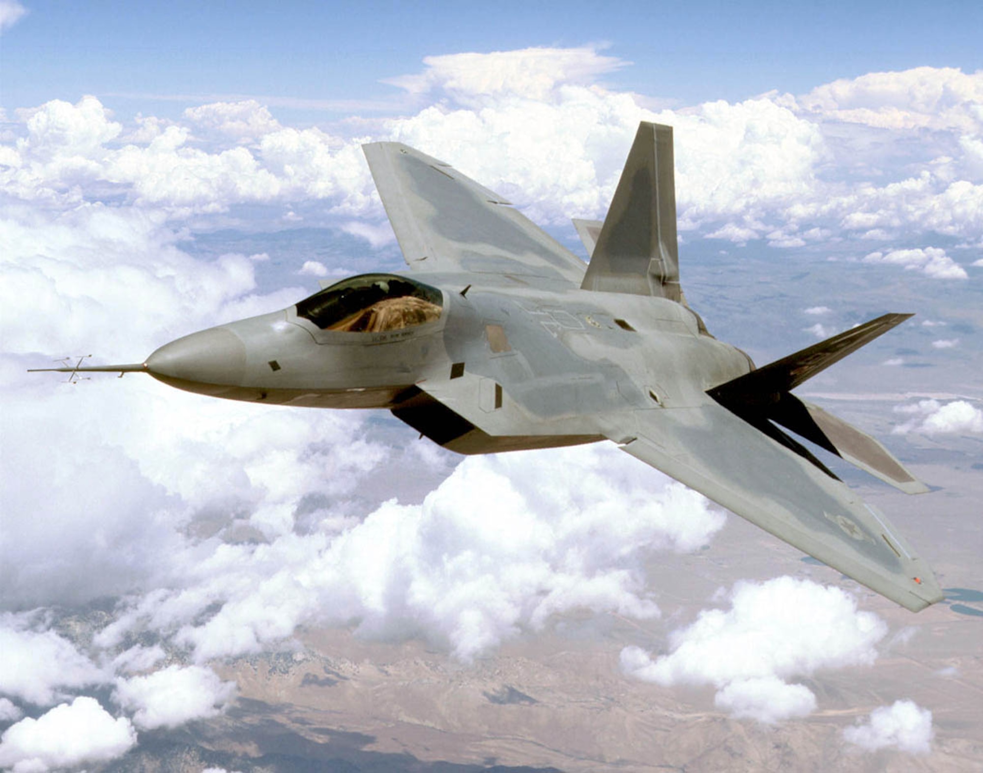 ABOVE THE MOJAVE DESERT -- The Air Force's new superiority fighter will dominate the future air combat arena by integrating advanced avionics, stealth and supercruise. With approximately 80 percent of development complete and two test aircraft flying, the F/A-22 Raptor program is nearing completion of a 13-year development program.  (U.S. Air Force photo Judson Brohmer)