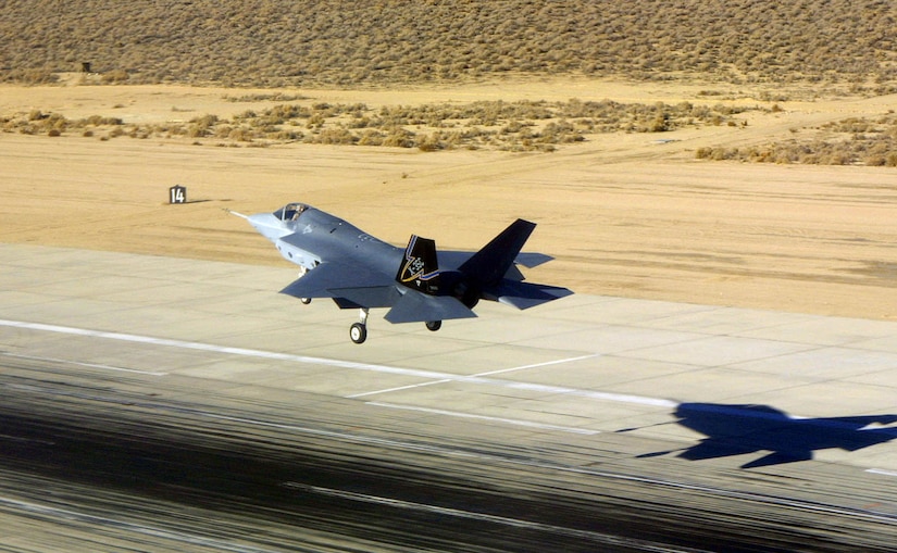 Lockheed Martin's X-35C Joint Strike Fighter touches down at Edwards Air Force Base, Calif., Dec. 18, 2000, after its first flight. The carrier variant JSF will be tested at Edwards and Naval Air Station Patuxent River, Md. (Courtesy photo by Judson Brohmer)

