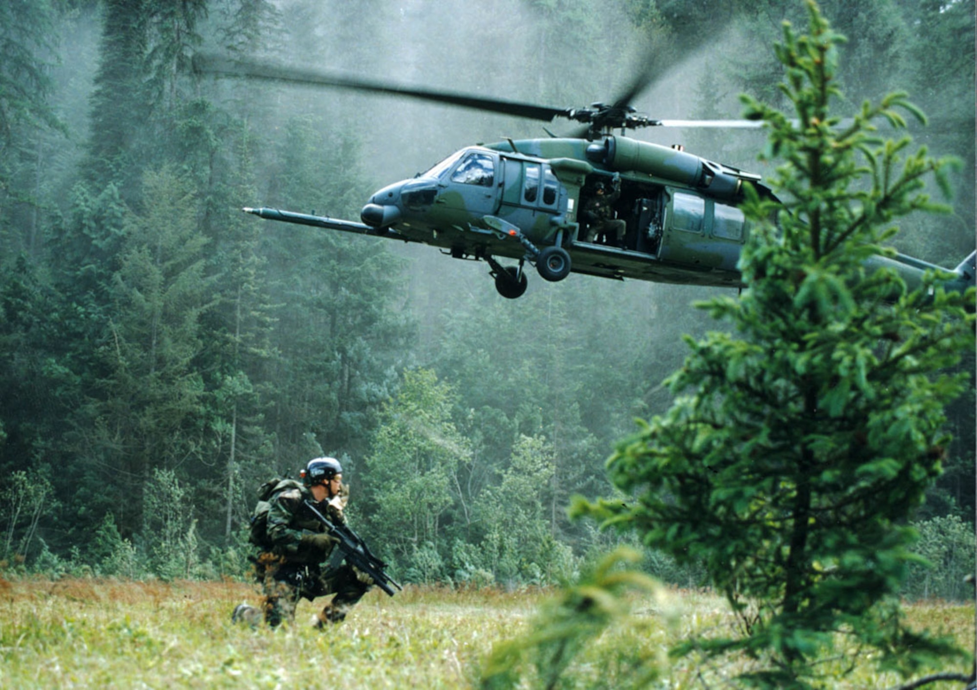 FILE PHOTO -- The primary mission of the HH-60G Pave Hawk helicopter is to conduct day or night operations into hostile environments to recover downed aircrew or other isolated personnel during war. Because of its versatility, the HH-60G is also tasked to perform military operations other than war. These tasks include civil search and rescue, emergency aeromedical evacuation, disaster relief, international aid, counterdrug activities and NASA space shuttle support.
(U.S. Air Force Photo) 